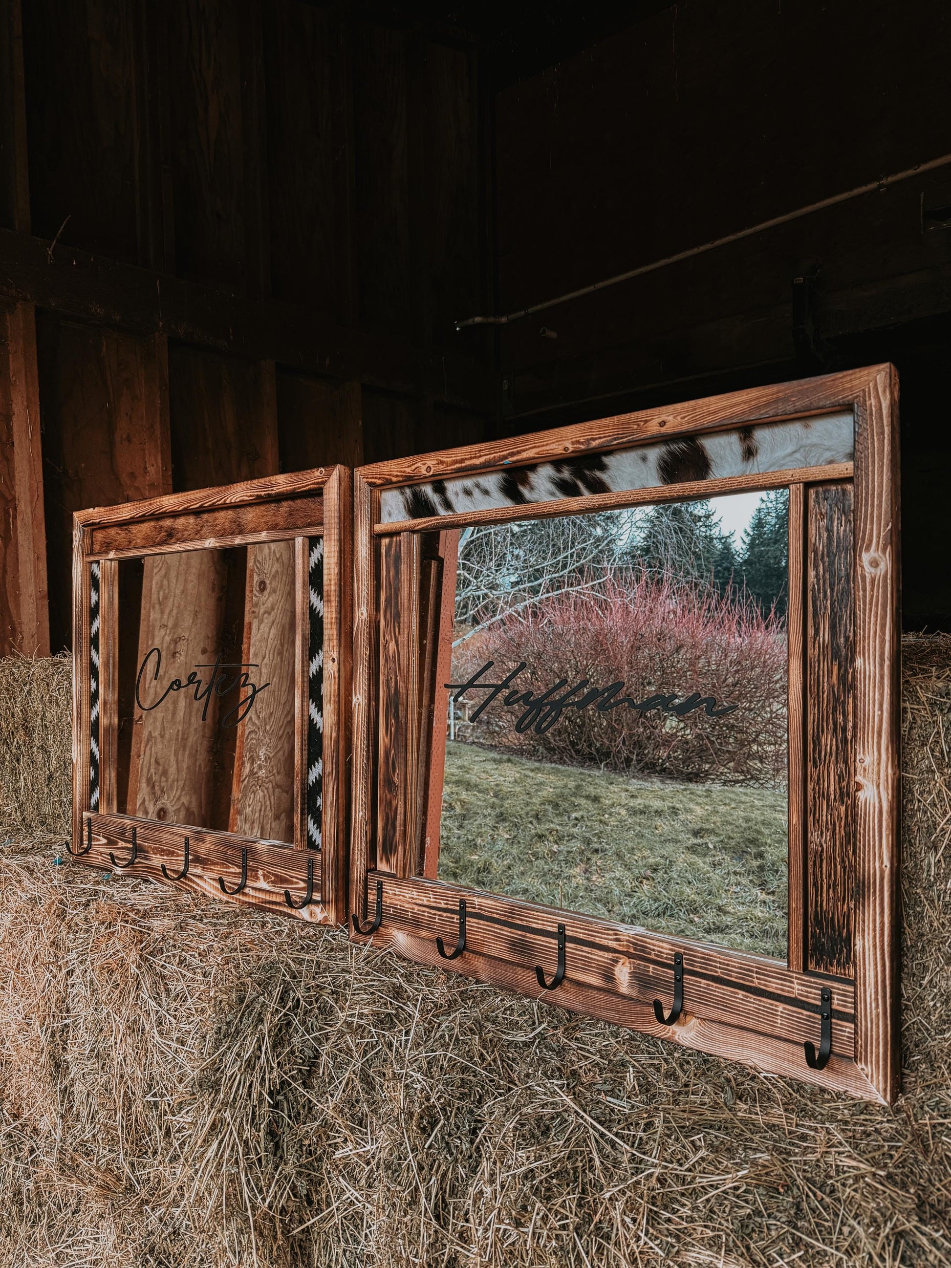Cowhide framed mirror with hangers